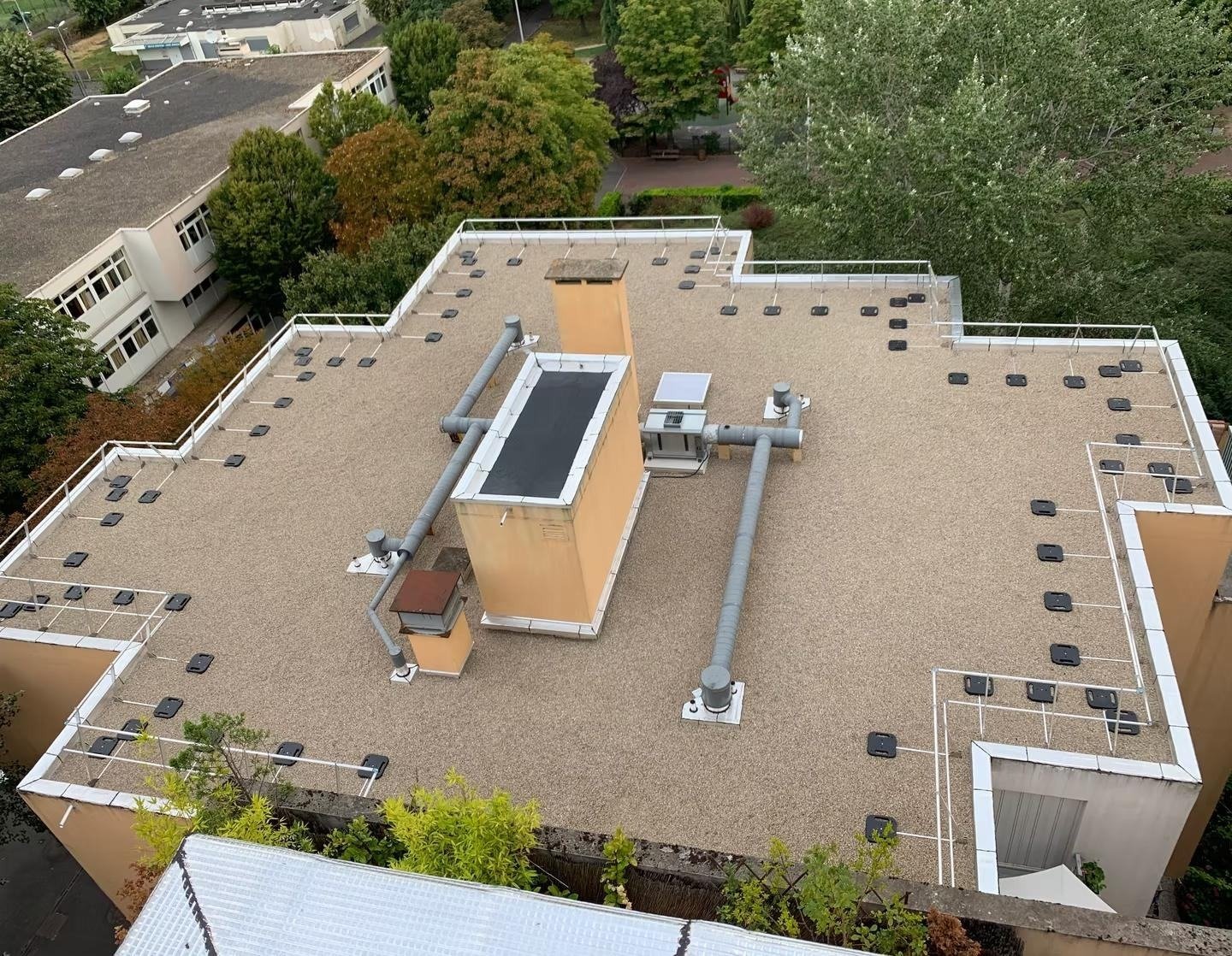 Toiture terrasse en graviers réalisée par EI2T